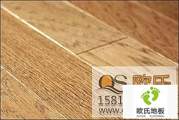 什么原因導致體育實木地板收縮與起鼓
